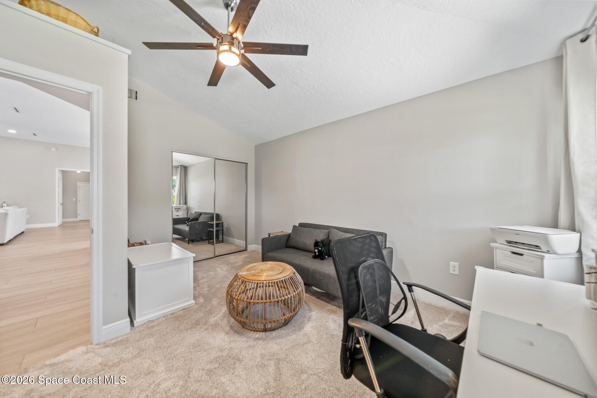 697 Spring Lake Drive Melbourne, FL 32940 - Photo 24 of 45 a view of a livingroom with furniture