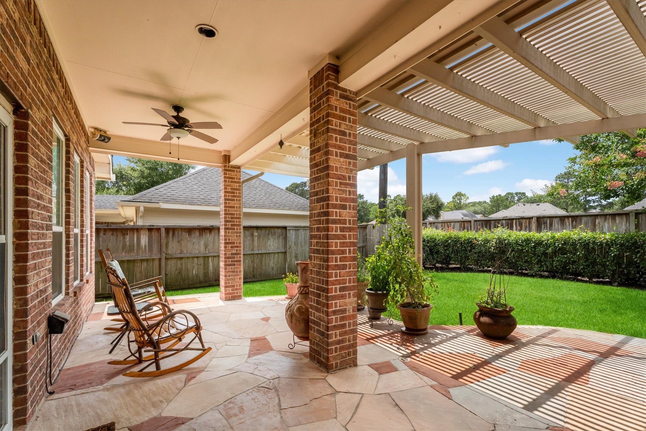 9406 Lochflora Drive Spring, TX 77379 - Photo 31 of 49 a view of garden with patio