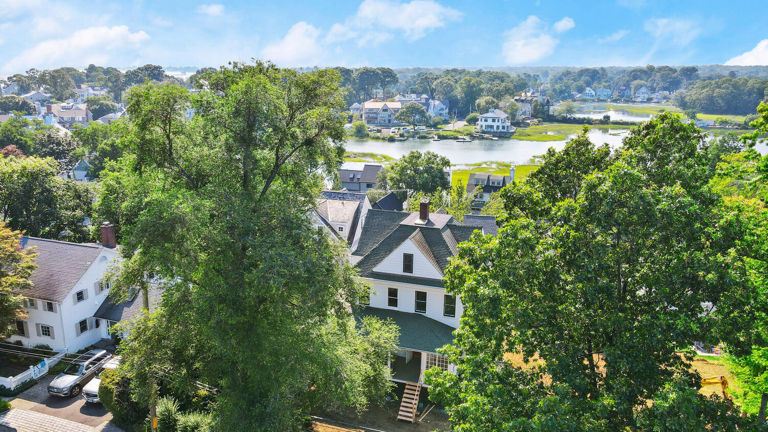 31 Yarmouth Road Rowayton, CT 06853 - Photo 6 of 15 an aerial view of residential houses with outdoor space and trees