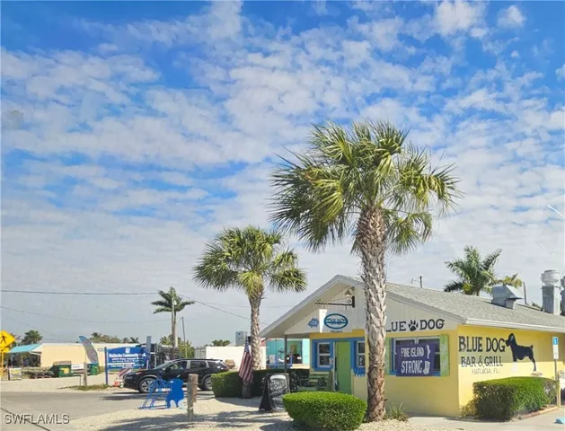 a view of a house with a street