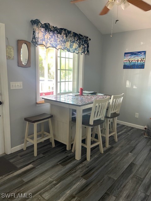 10796 Russell Road Bokeelia, FL 33922 - Photo 21 of 47 a view of a dining room with furniture window and wooden floor
