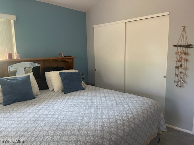 10796 Russell Road Bokeelia, FL 33922 - Photo 25 of 47 a large bed sitting in a bedroom next to a window