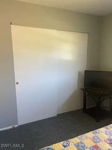 a view of balcony with wooden floor and outdoor seating