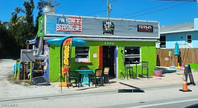 a view of outdoor space with deck and yard
