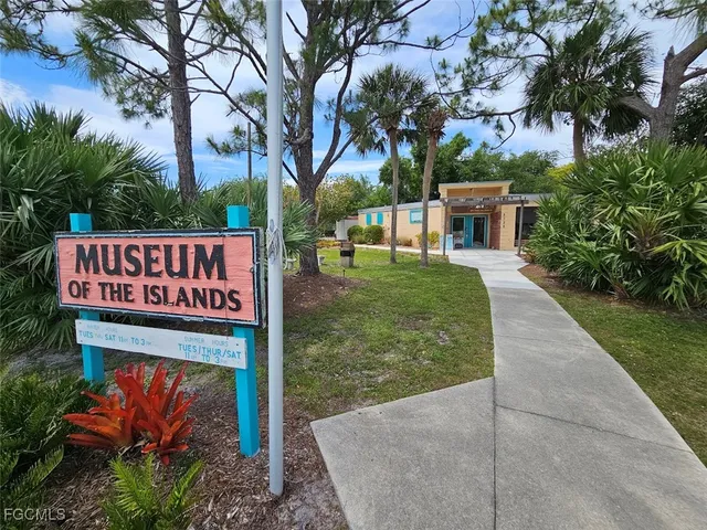 a view of a swimming pool with a yard