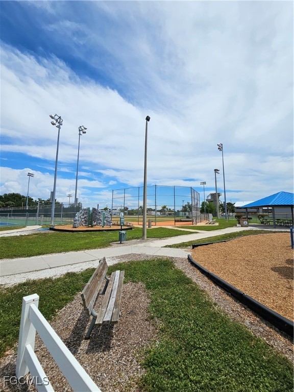 10796 Russell Road Bokeelia, FL 33922 - Photo 45 of 47 a view of a swimming pool with a yard