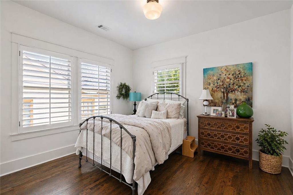 221 3rd Avenue Decatur, GA 30030 - Photo 18 of 37 a bedroom with a bed and a window