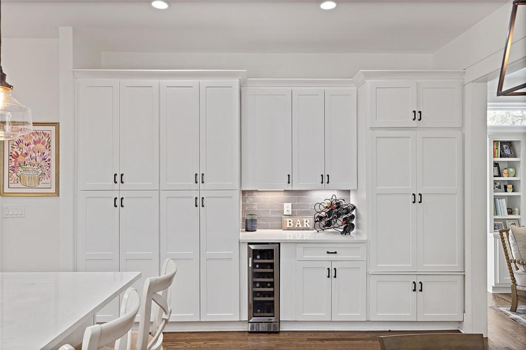 221 3rd Avenue Decatur, GA 30030 - Photo 25 of 37 a kitchen with white cabinets and white appliances