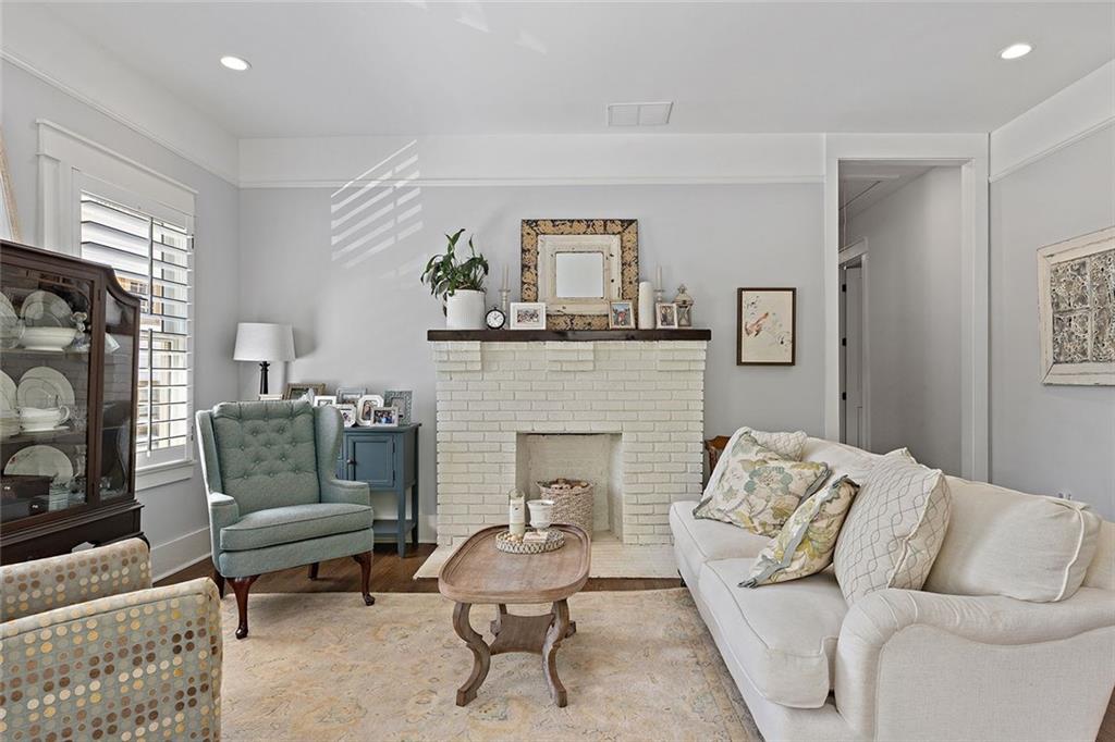 221 3rd Avenue Decatur, GA 30030 - Photo 3 of 37 a living room with furniture and a fireplace