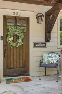 a bench sitting in front of a door