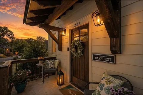 a view of a door and chair in the balcony
