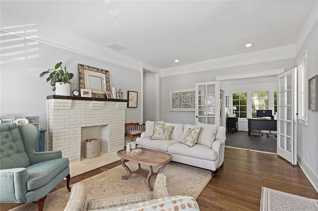 221 3rd Avenue Decatur, GA 30030 - Photo 6 of 37 a living room with furniture and a fireplace