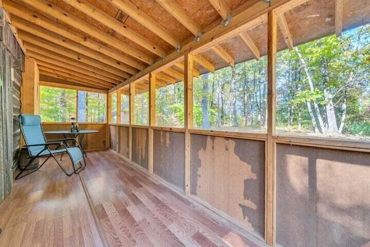 0 Six Mile Post Road Callaway, VA 24067 - Photo 17 of 73 a view of a balcony with chairs and wooden floor