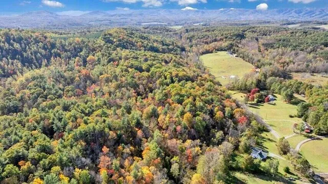 a backyard of a house with barbeque oven