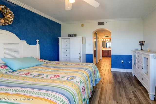 a view of a street with outdoor seating