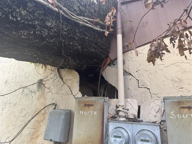 a view of a house with a yard and garage