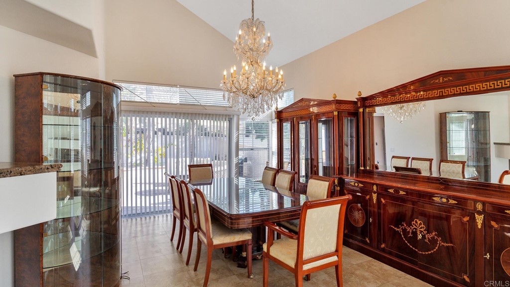 5979 Corte Playa Pacifica San Diego, CA 92124 - Photo 14 of 38 a view of a dining room with furniture window and outside view