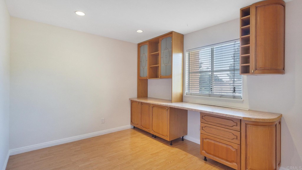 5979 Corte Playa Pacifica San Diego, CA 92124 - Photo 21 of 38 an empty room with windows