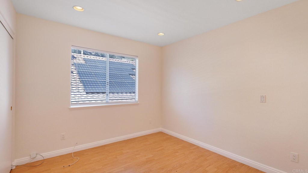 5979 Corte Playa Pacifica San Diego, CA 92124 - Photo 23 of 38 a view of an empty room with a window