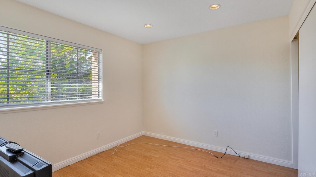 5979 Corte Playa Pacifica San Diego, CA 92124 - Photo 25 of 38 an empty room with a window