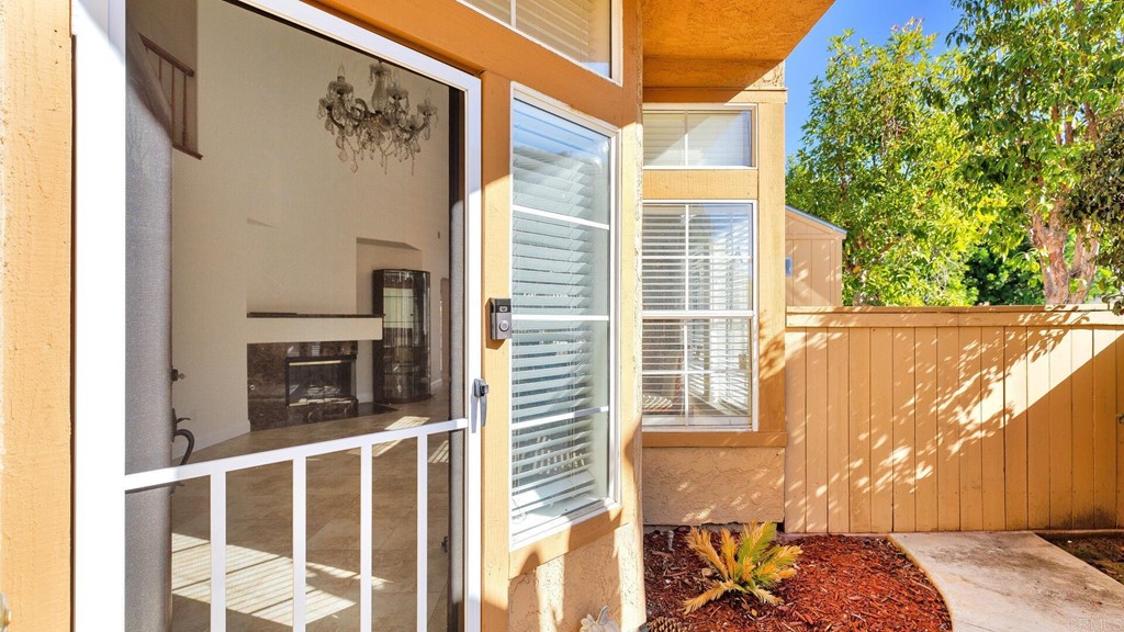 5979 Corte Playa Pacifica San Diego, CA 92124 - Photo 32 of 38 a view of a balcony with a door