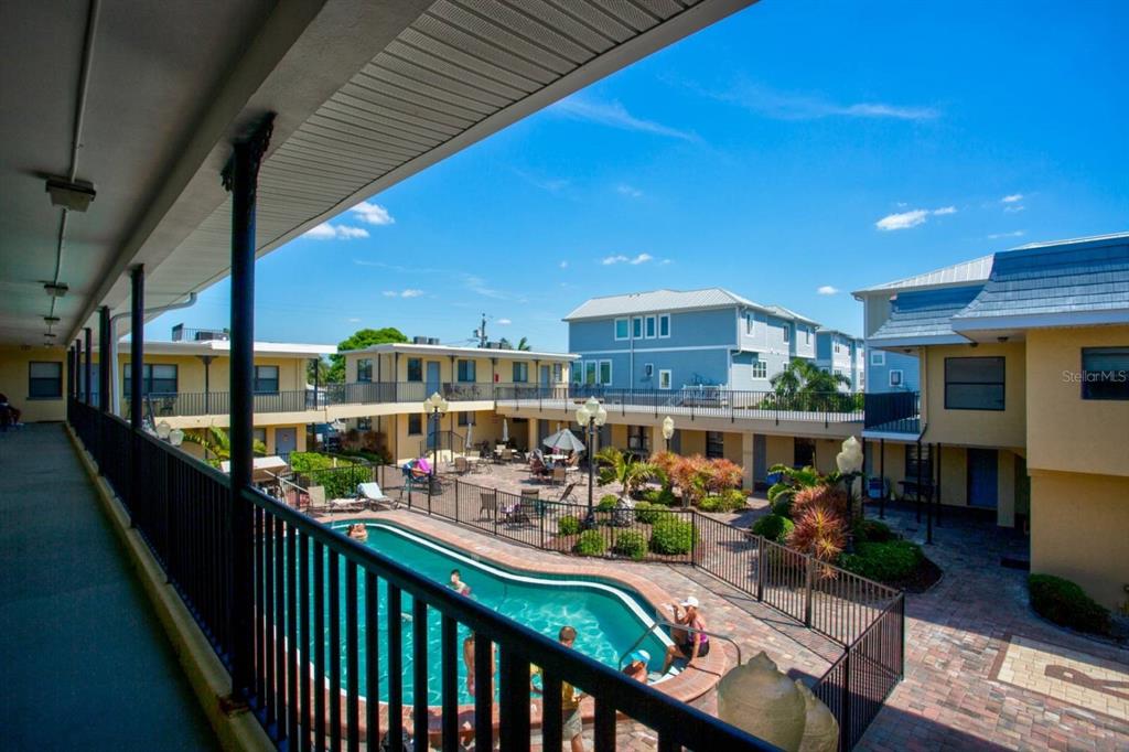 16333 Gulf Boulevard, Unit 204 Redington Beach, FL 33708 - Photo 6 of 43 a city view from a balcony