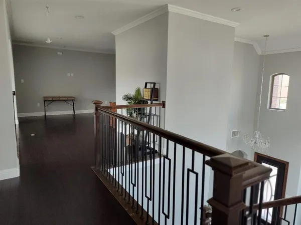 a view of entryway and hall with a window