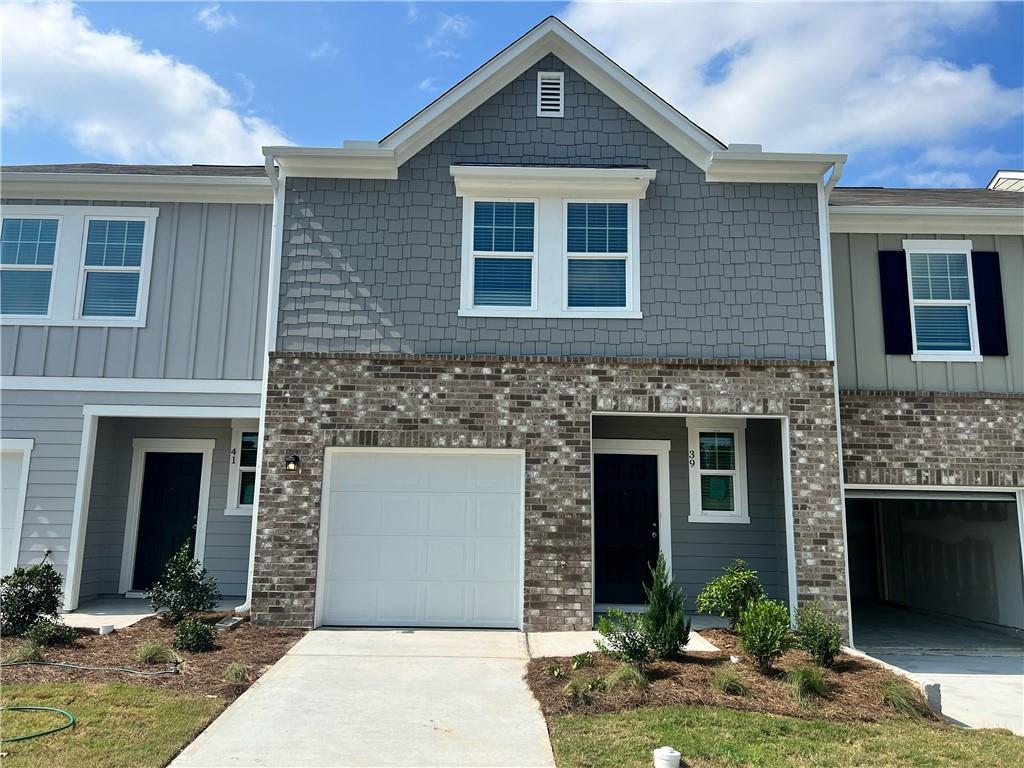39 Kielder Drive Winder, GA 30680 - Photo 1 of 1 a front view of a house with yard
