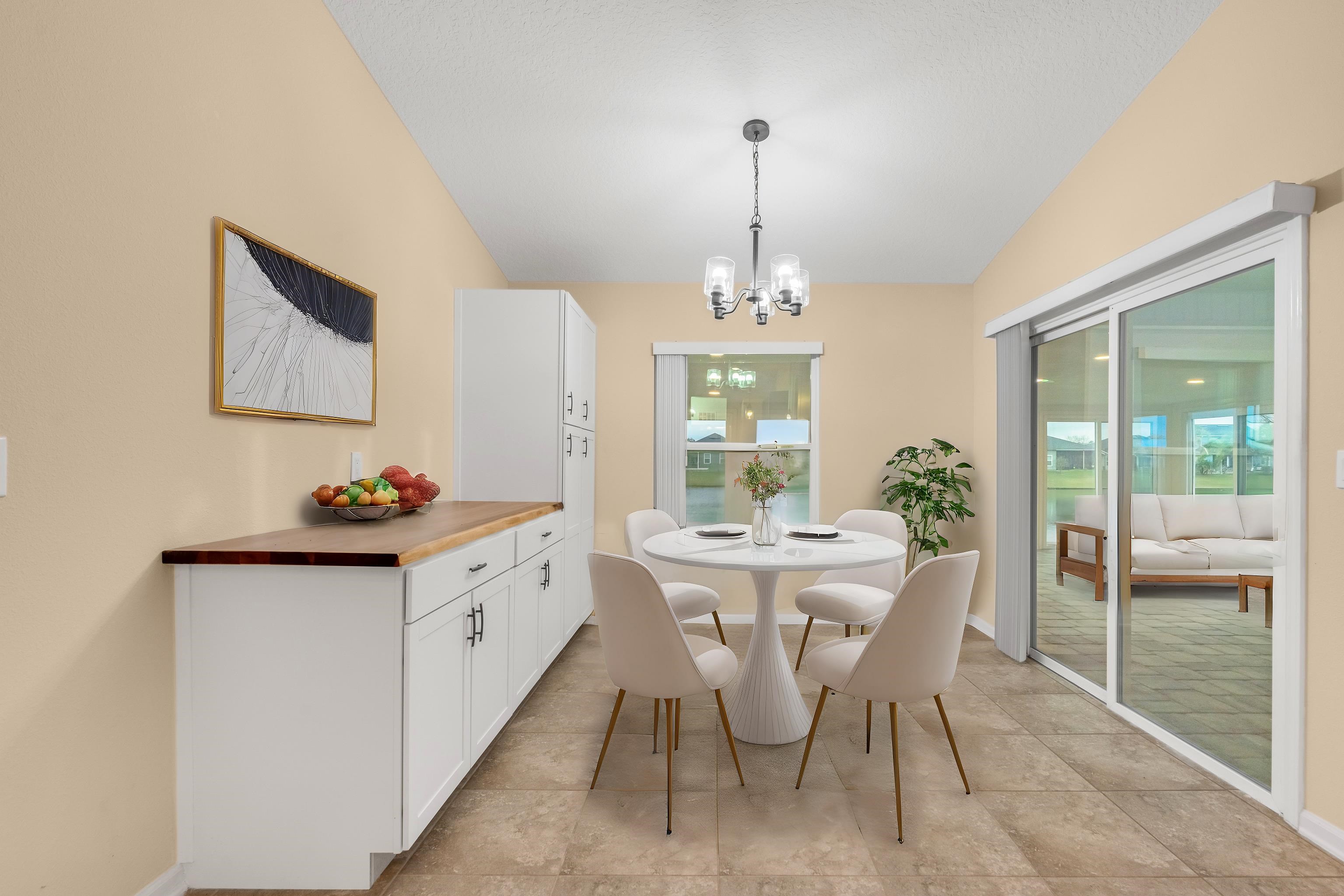 228 Fox Water Trail St. Augustine, FL 32086 - Photo 27 of 50 a view of a dining room with furniture window and outside view