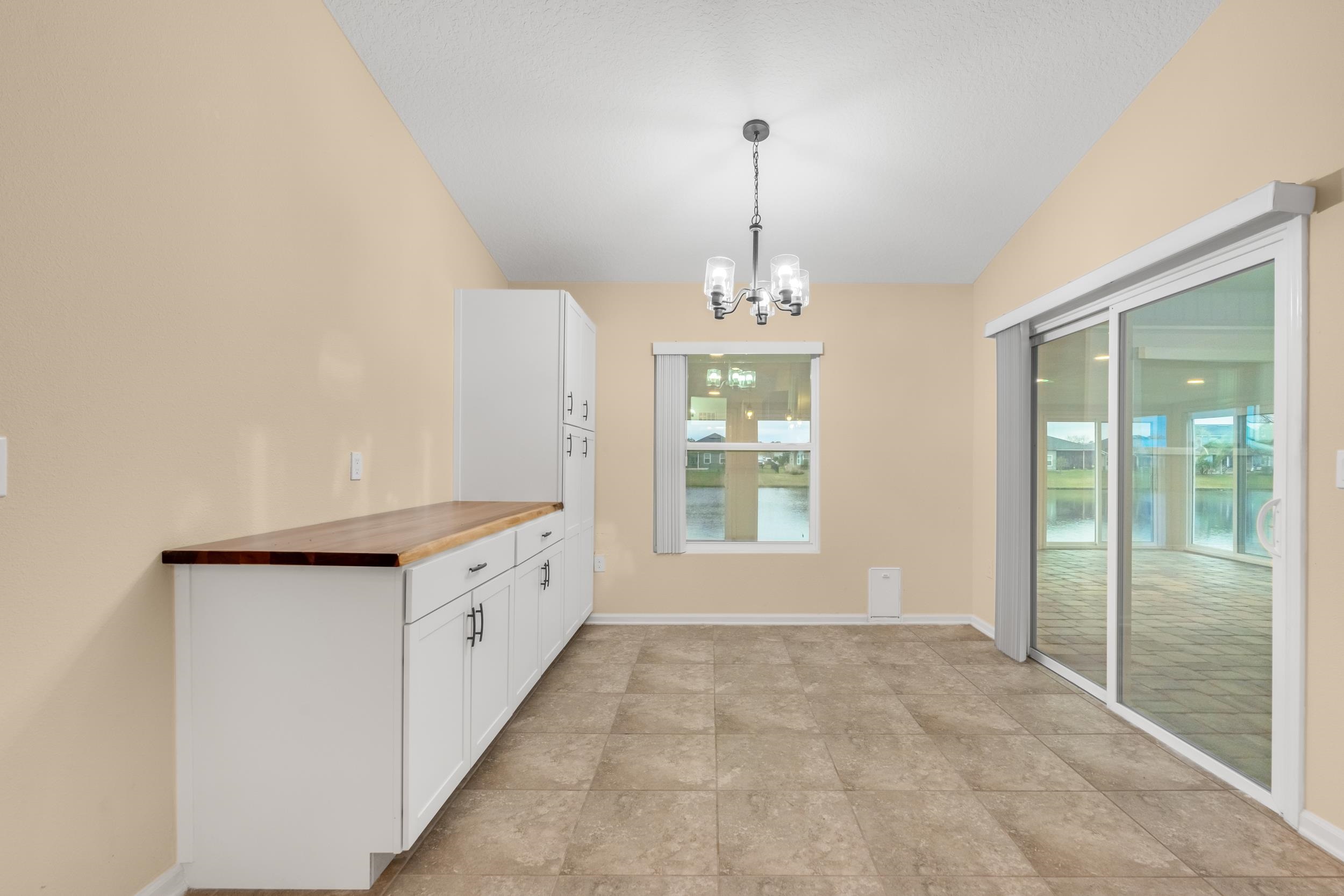 228 Fox Water Trail St. Augustine, FL 32086 - Photo 28 of 50 a view of an empty room and window