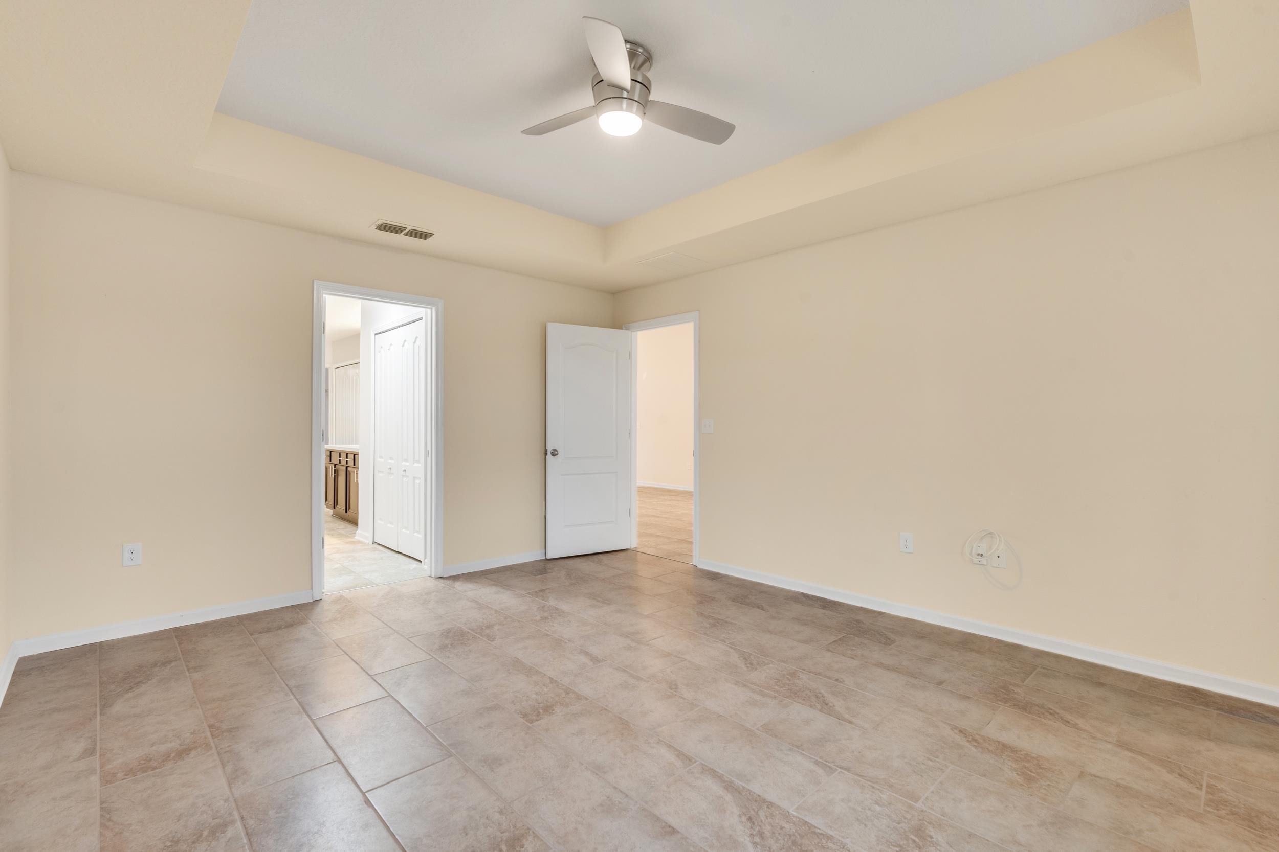 228 Fox Water Trail St. Augustine, FL 32086 - Photo 34 of 50 wooden floor in an empty room