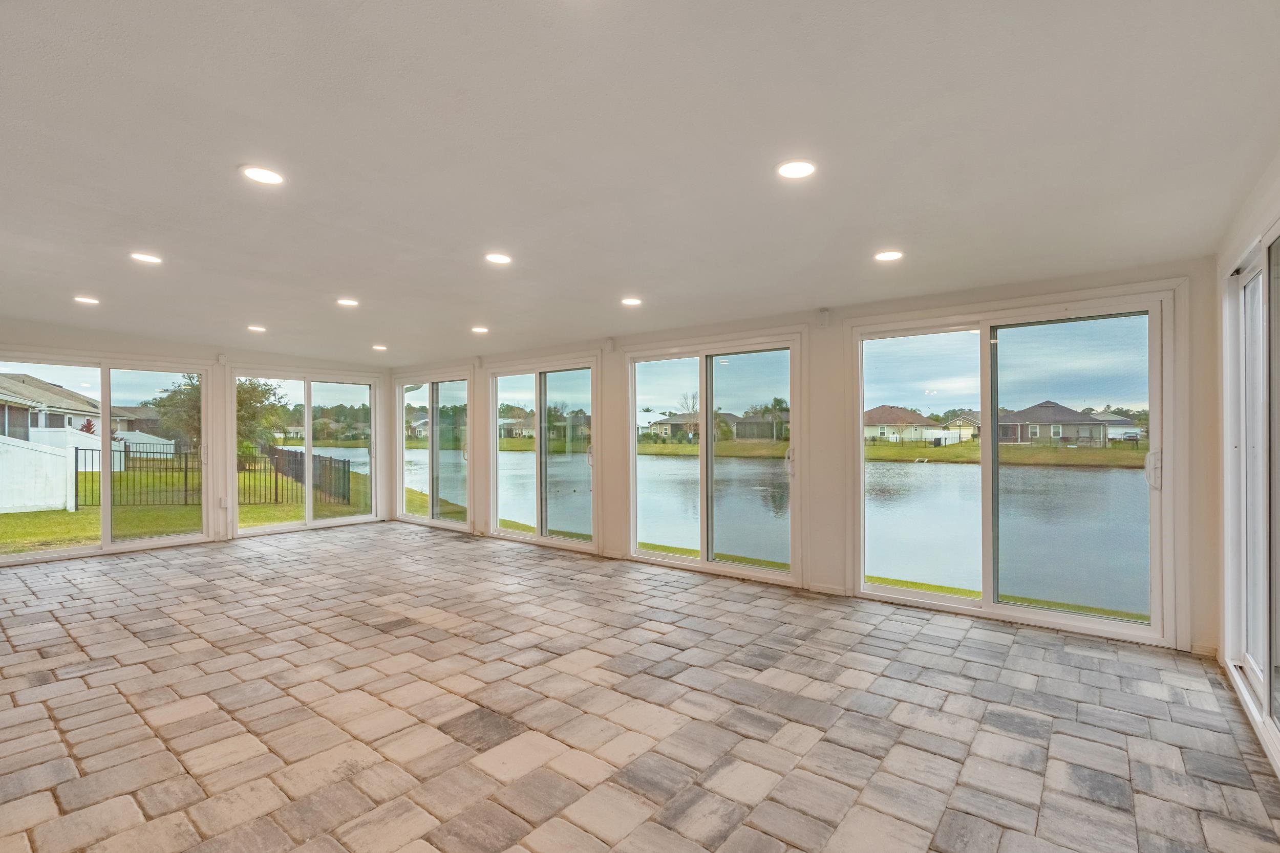 228 Fox Water Trail St. Augustine, FL 32086 - Photo 41 of 50 a view of an empty room with a large window