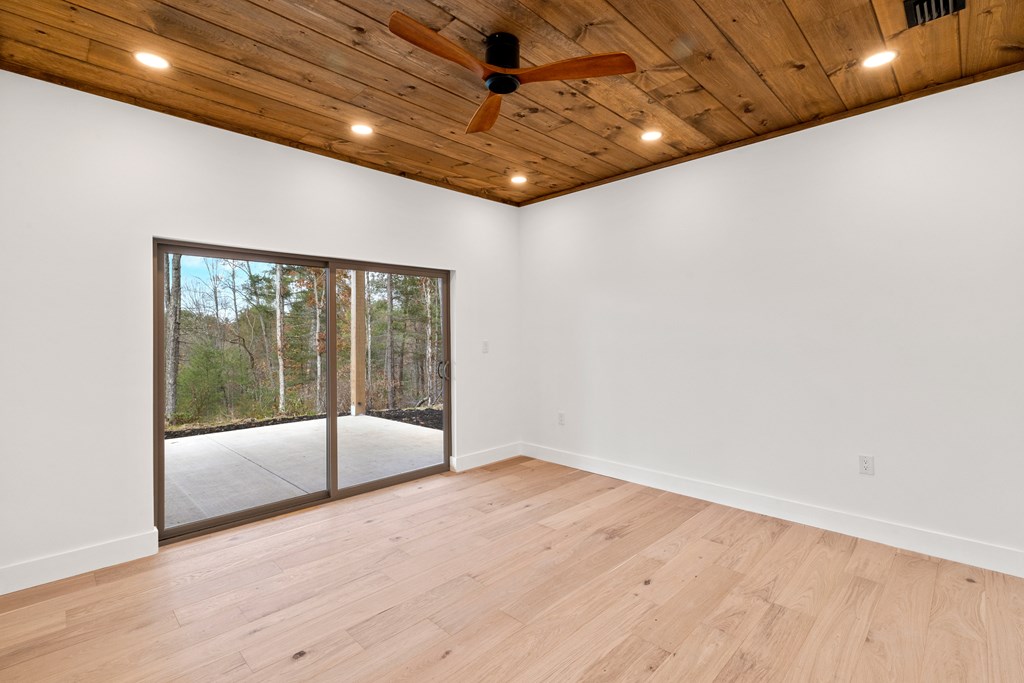 1713 Old Northcutt Road Ellijay, GA 30536 - Photo 30 of 45 a view of an empty room with a sliding door