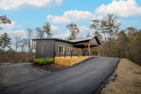 a view of a porch in front of house