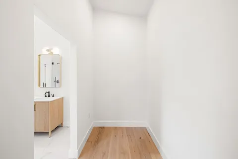 a view of bathroom with dual sinks