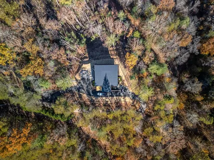 a view of a house with a tree