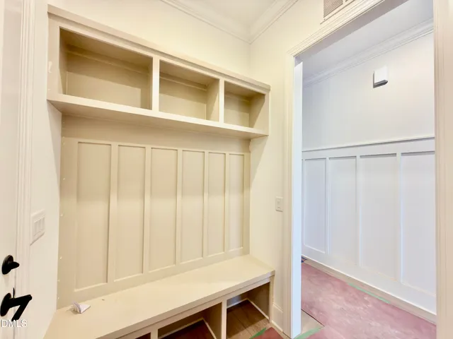 a bathroom with a sink mirror vanity and a toilet