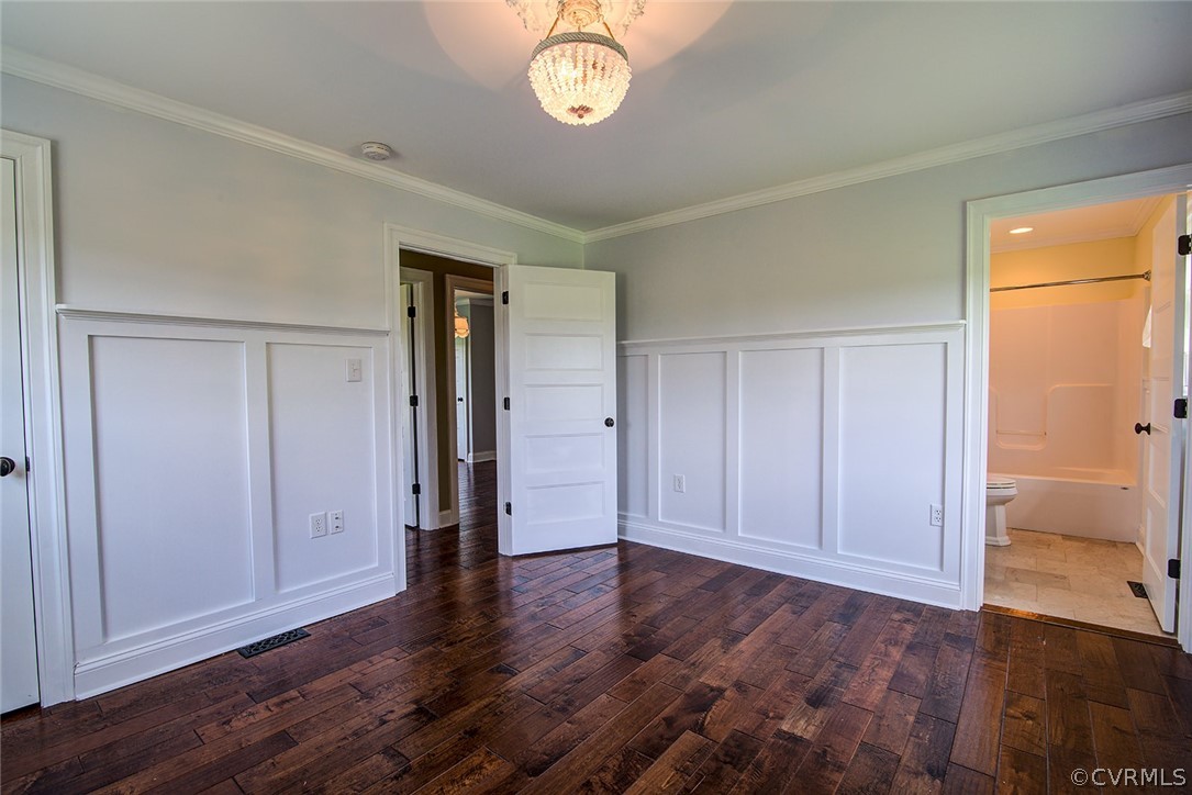 840 Fallin Town Road Warsaw, VA 22572 - Photo 20 of 25 Second Master Bedroom with wood floors, wainscotin