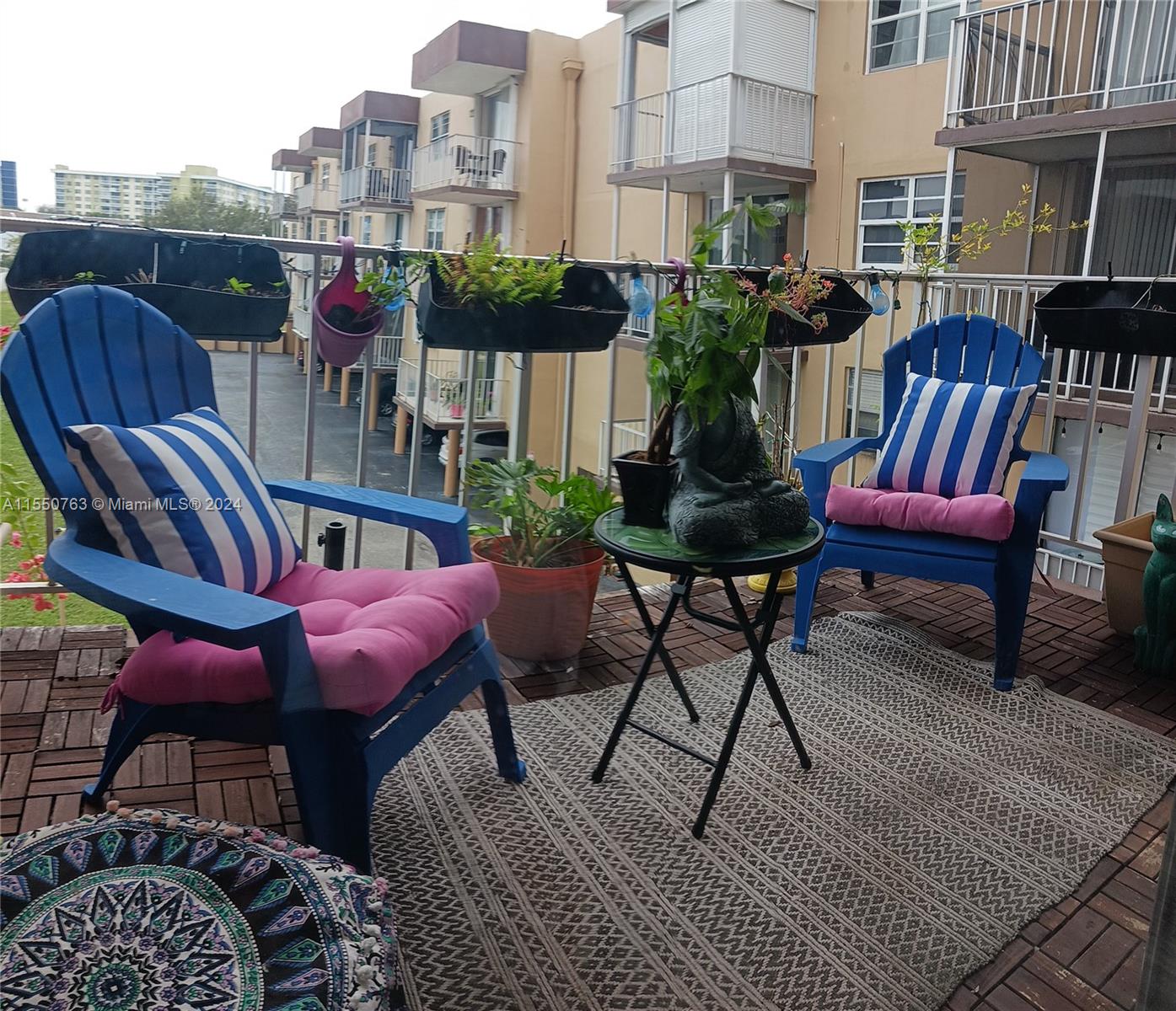 a view of a chairs and tables in patio
