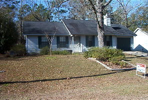 103 Beacon''s Bend Road Crestview, FL 32536 - Photo 1 of 1 a front view of a house with garden