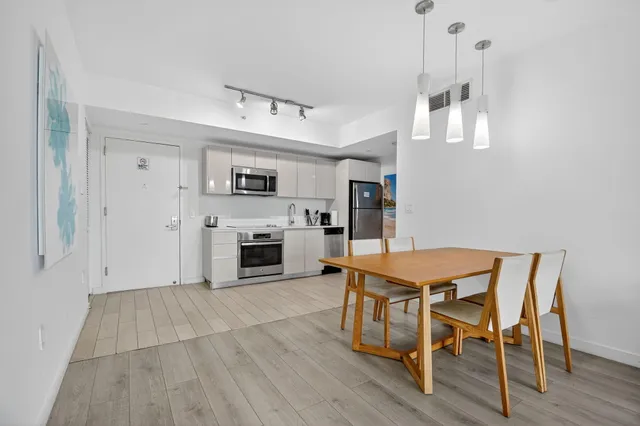 a bathroom with a toilet sink and a shower
