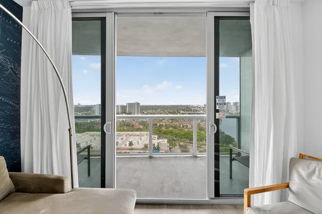 a view of a swimming pool with a yard