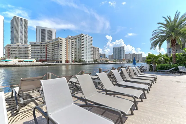 a picture of a bathroom with a white wall