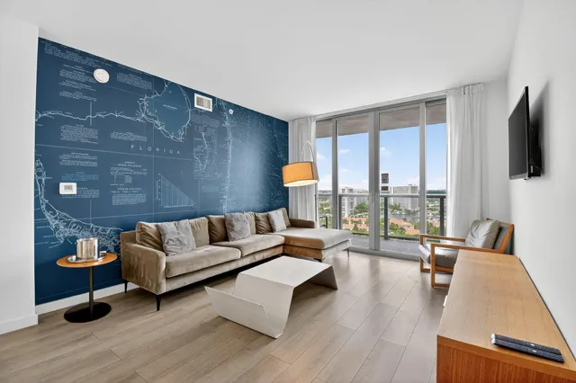 a bedroom with a bed and a table