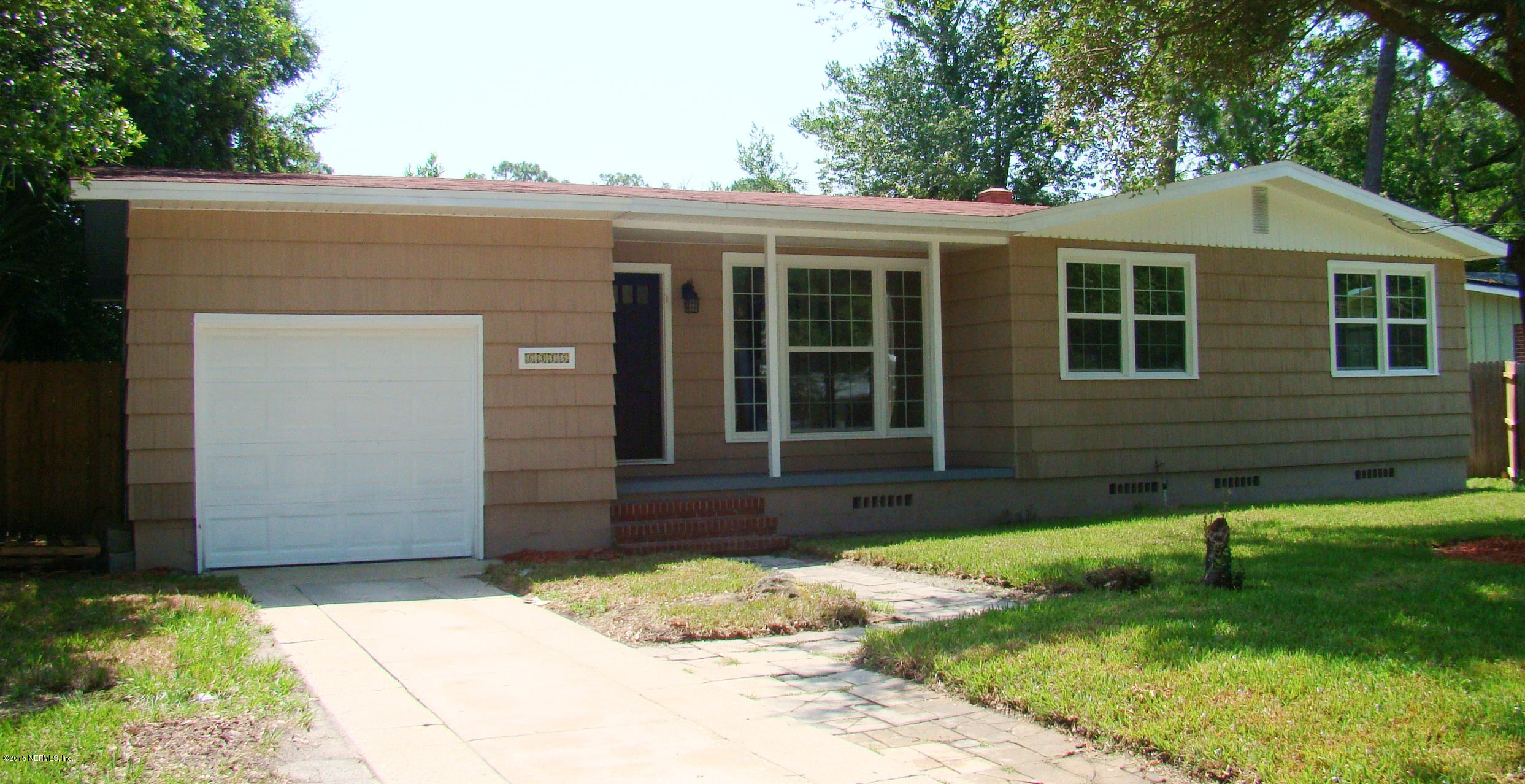 6315 Temple Road Jacksonville, FL 32217 - Photo 1 of 12 a front view of a house