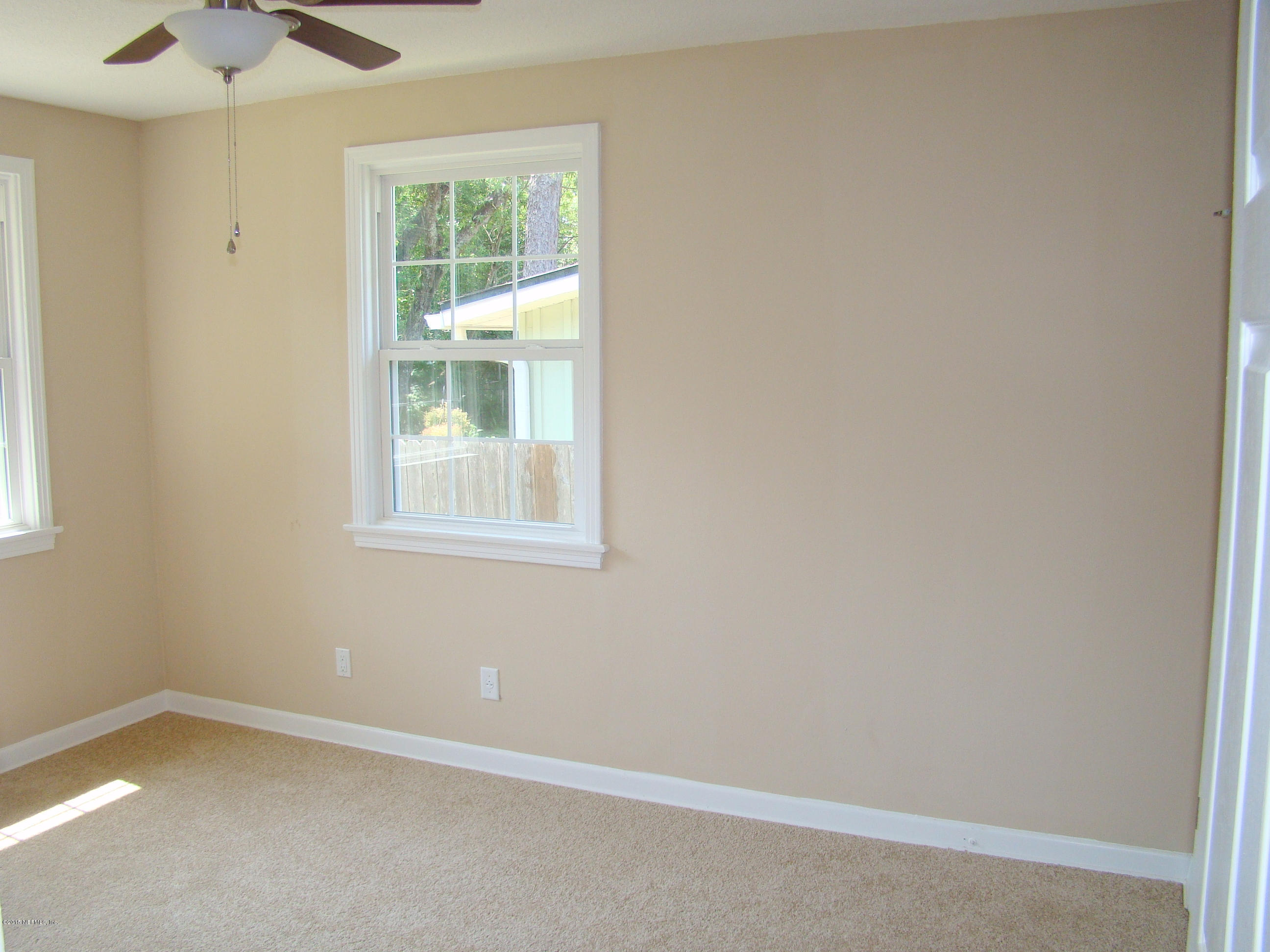 6315 Temple Road Jacksonville, FL 32217 - Photo 10 of 12 an empty room with a window
