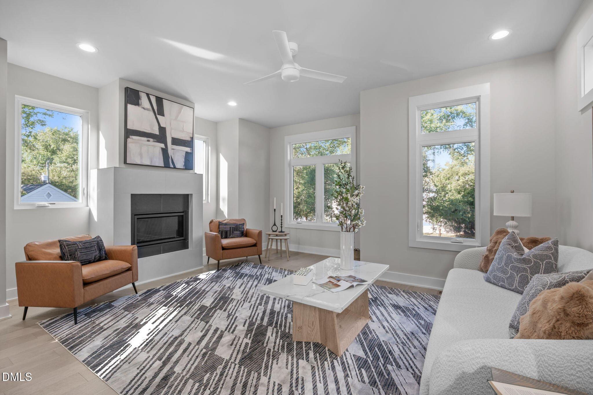 228 Woodsborough Place Raleigh, NC 27601 - Photo 13 of 59 a living room with furniture fireplace and window