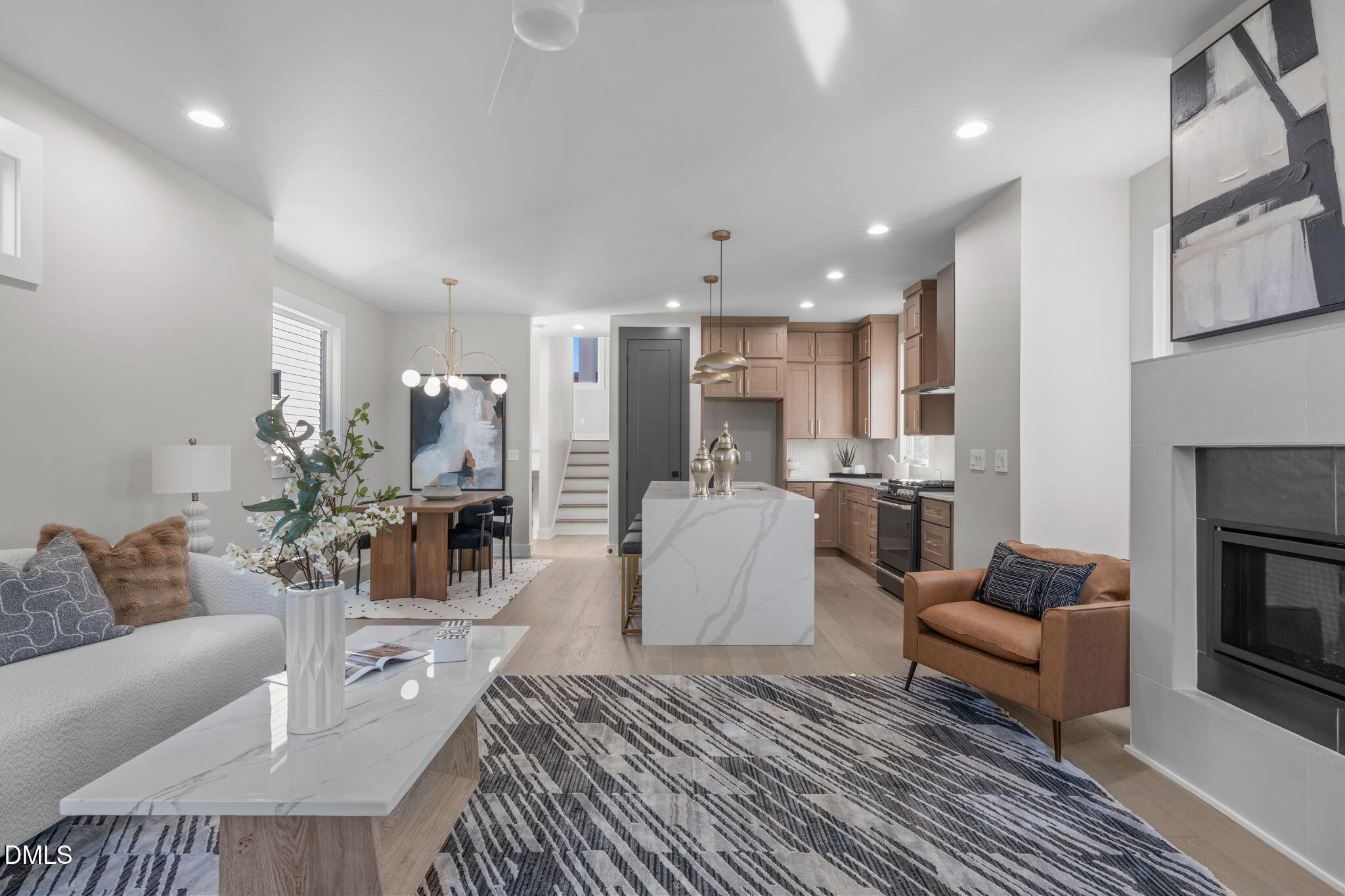 228 Woodsborough Place Raleigh, NC 27601 - Photo 14 of 59 a living room with furniture and a fireplace