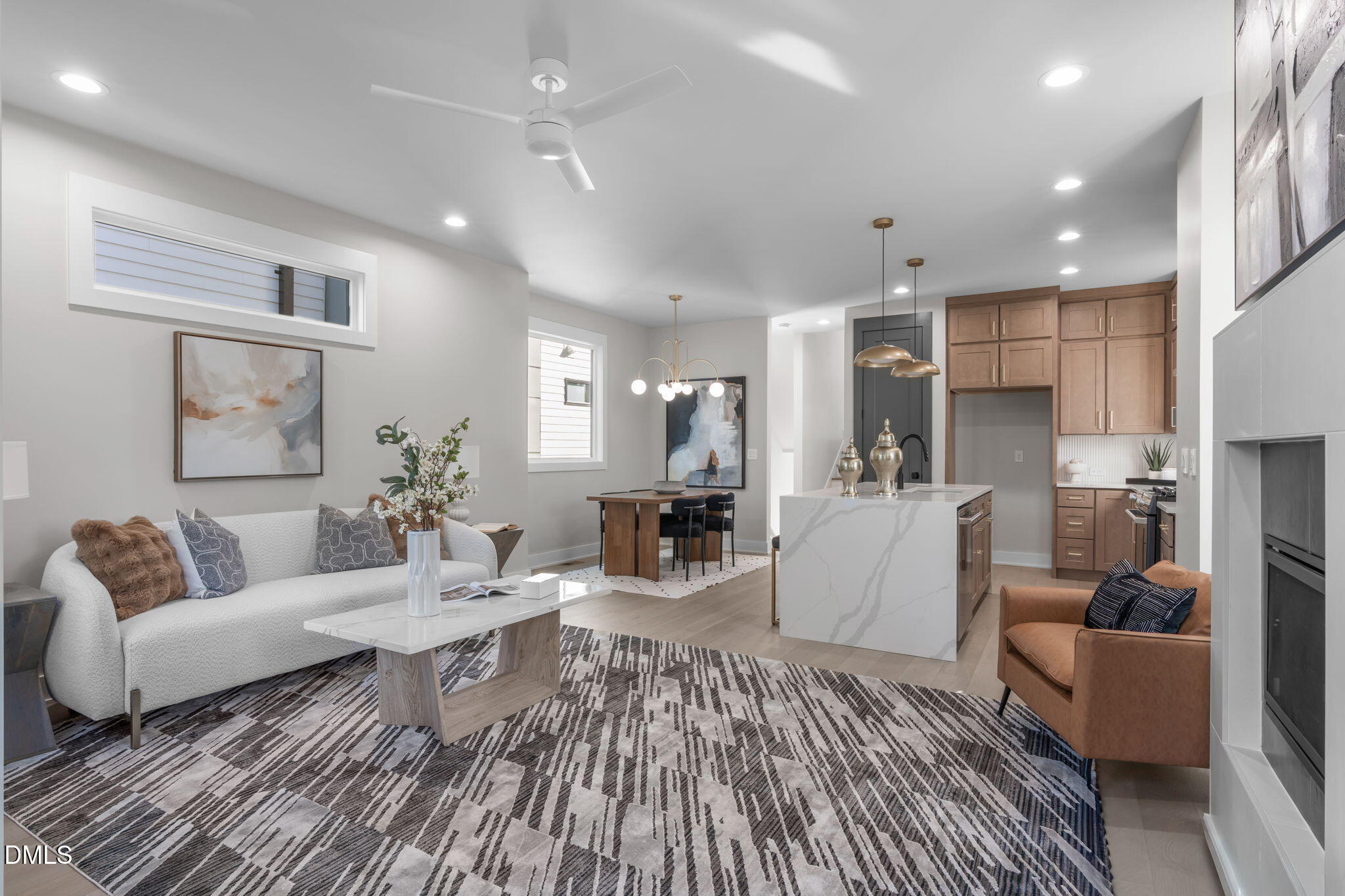 228 Woodsborough Place Raleigh, NC 27601 - Photo 15 of 59 a living room with furniture and a wooden floor