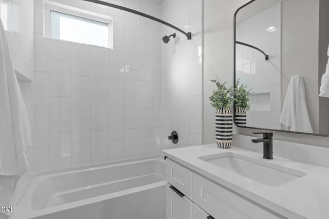 a view of staircase with white walls and a window